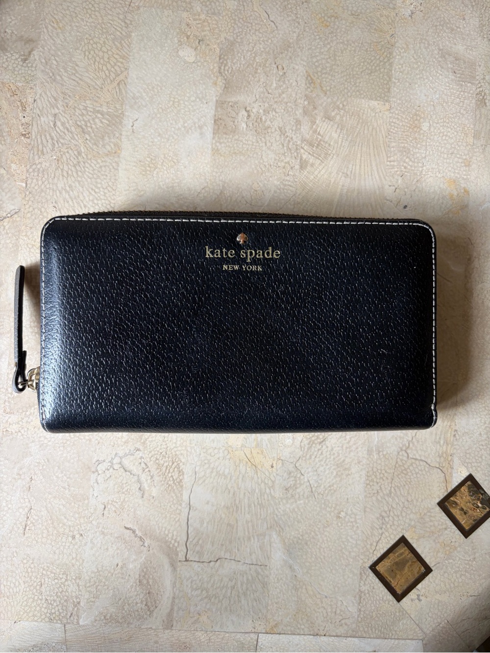 kate spade Black Pebbled Zip-Around Wallet with Gold Logo